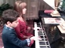 Debby Ryan gives Cameron a quick piano lesson 042