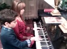 Debby Ryan gives Cameron a quick piano lesson 043