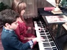 Debby Ryan gives Cameron a quick piano lesson 045