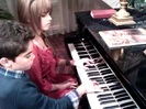 Debby Ryan gives Cameron a quick piano lesson 049