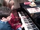 Debby Ryan gives Cameron a quick piano lesson 052