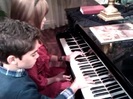Debby Ryan gives Cameron a quick piano lesson 053