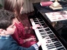 Debby Ryan gives Cameron a quick piano lesson 057