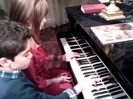 Debby Ryan gives Cameron a quick piano lesson 058
