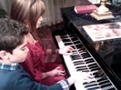 Debby Ryan gives Cameron a quick piano lesson 059