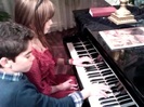 Debby Ryan gives Cameron a quick piano lesson 060