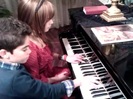Debby Ryan gives Cameron a quick piano lesson 062