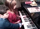 Debby Ryan gives Cameron a quick piano lesson 063