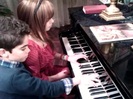 Debby Ryan gives Cameron a quick piano lesson 064
