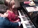 Debby Ryan gives Cameron a quick piano lesson 065