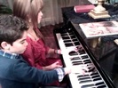 Debby Ryan gives Cameron a quick piano lesson 067
