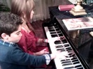 Debby Ryan gives Cameron a quick piano lesson 068