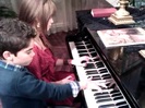 Debby Ryan gives Cameron a quick piano lesson 069