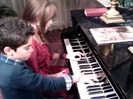 Debby Ryan gives Cameron a quick piano lesson 070