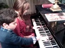 Debby Ryan gives Cameron a quick piano lesson 072