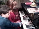 Debby Ryan gives Cameron a quick piano lesson 074