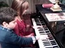 Debby Ryan gives Cameron a quick piano lesson 075