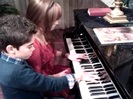 Debby Ryan gives Cameron a quick piano lesson 076
