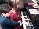 Debby Ryan gives Cameron a quick piano lesson 078