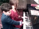 Debby Ryan gives Cameron a quick piano lesson 081
