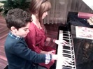 Debby Ryan gives Cameron a quick piano lesson 084