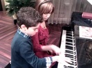 Debby Ryan gives Cameron a quick piano lesson 097