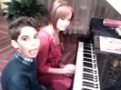 Debby Ryan gives Cameron a quick piano lesson 187