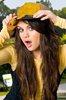 selena-gomez-cute-pose-surprised-yellow-hat