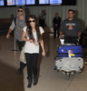 normal_26052_Preppie_-_Miley_Cyrus_arriving_at_LAX_Airport_-_Jan__6_2010_220_122_917lo
