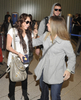 normal_26061_Preppie_-_Miley_Cyrus_arriving_at_LAX_Airport_-_Jan__6_2010_643_122_491lo