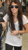 normal_26088_Preppie_-_Miley_Cyrus_arriving_at_LAX_Airport_-_Jan__6_2010_396_122_512lo