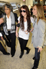 normal_26123_Preppie_-_Miley_Cyrus_arriving_at_LAX_Airport_-_Jan__6_2010_1131_122_885lo