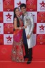 187473-karan-tacker-and-krystal-dsouza-at-star-parivaar-awards-red-car