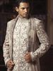 jute_sherwani_highlighted_with_resham_work_and_worn_with_a_shawl