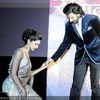 Ranveer-Singh-offers-a-hand-to-Deepika-Padukone-as-the-actresses-steps-on-to-the-stage-during-the-tr