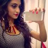 Krystle Dsouza with Iphone