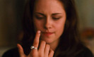 Bella looks at her finger