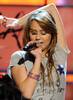 miley-cyrus_COM-kidsinagural-wearetbefutureconcert-2009jan19-001