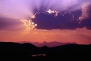 Sun Hyding behind Cloud