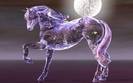 Glass_horse_figure_with_moon_against_night_sky