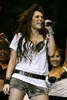 Miley-Performs-Jingle-Bell-Ball-miley-cyrus-9346204-266-400