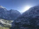 Sun Rising from behind Mountain